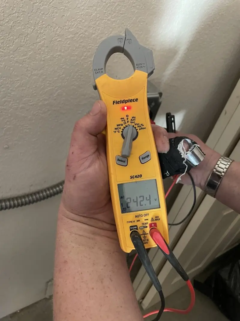 Voltage testing with clamp meter during Recessed Lighting Installation in Wetumpka